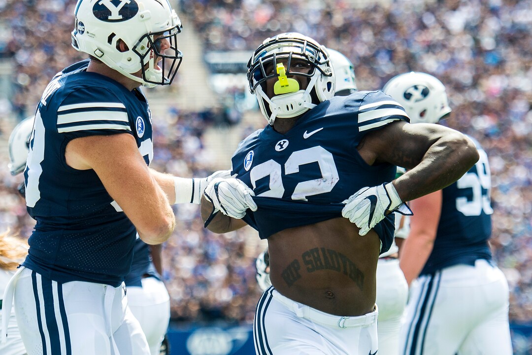 (Chris Detrick  |  The Salt Lake Tribune) Brigham Young Cougars running back Squally Canada (22) celebrates after scoring a touchdown during the game at LaVell Edwards Stadium Saturday, August 26, 2017.