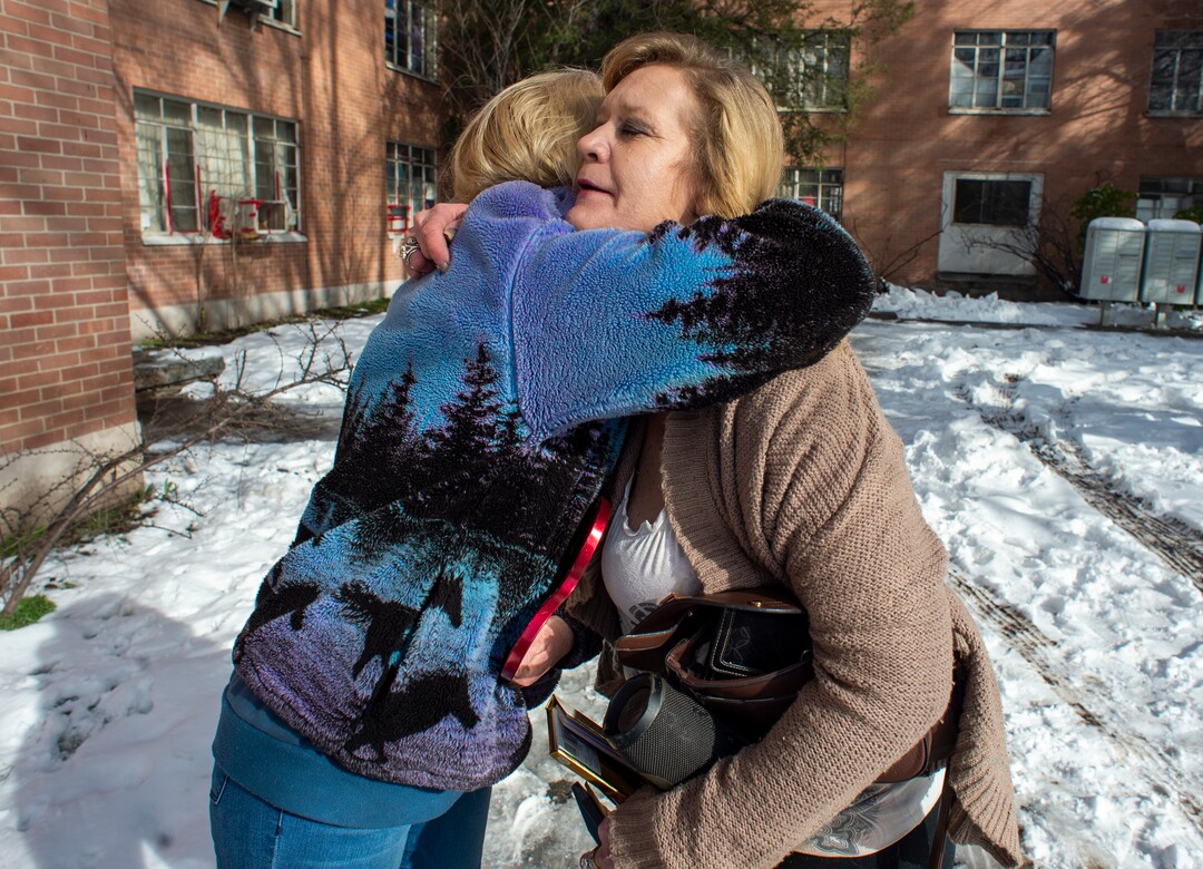 (Rick Egan  |  The Salt Lake Tribune)   Christy Carlson hugs her friend Theresa as she prepares to move out of her apartment at the Georgia Apartment complex. Yesterday the Salt Lake City Fire Department "red tagged" the apartment complex, giving tenants 72 hours to vacate their apartments. Tuesday, Feb. 12, 2019.