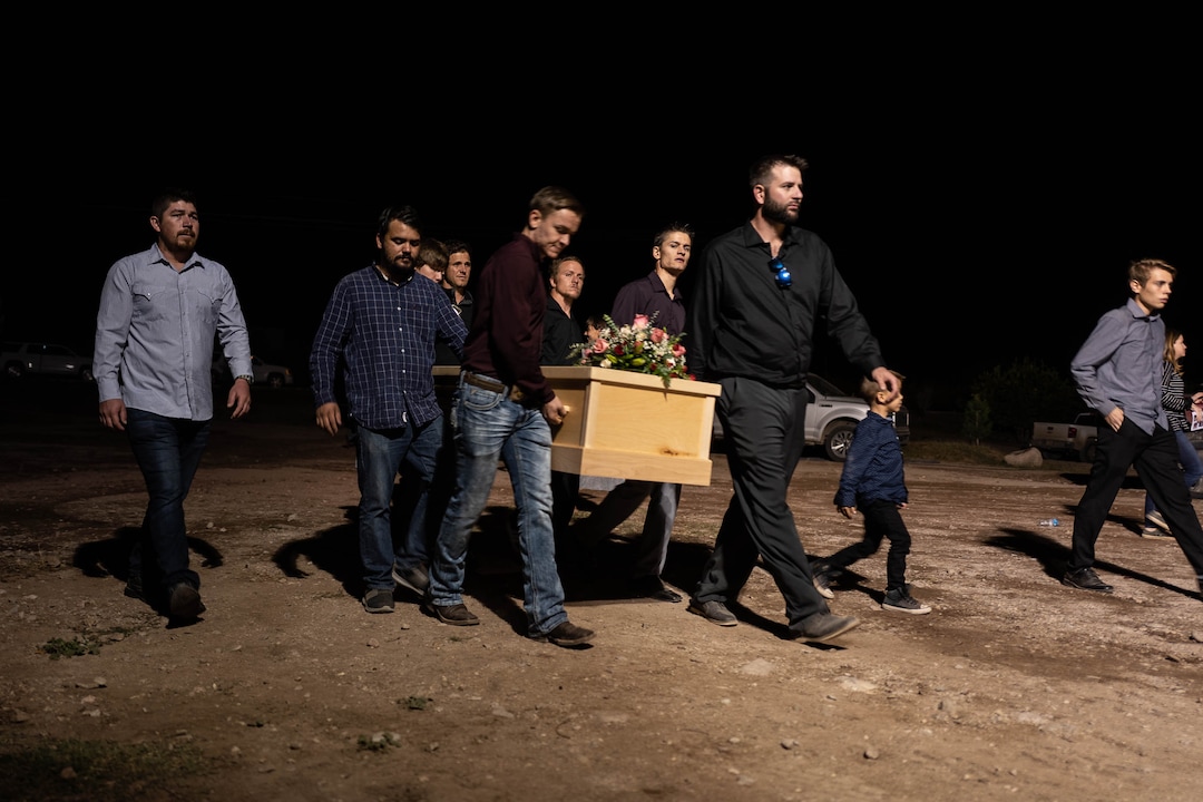 (Trent Nelson  |  The Salt Lake Tribune)Pallbearers carry the remains of four children who died with their mother Maria Rhonita Miller, following their funeral in La Mora, Sonora on Thursday Nov. 7, 2019. Howard Jacob Jr., 12; Krystal Bellaine, 10; Titus Alvin Miller, 8 months; and his twin sister, Tiana Gricel.