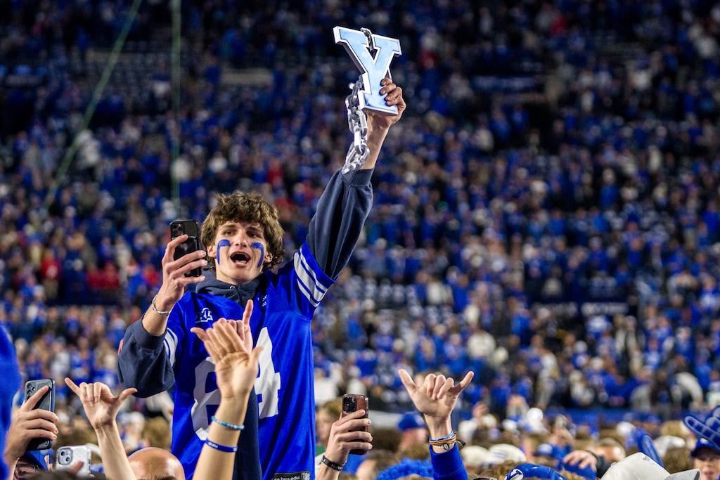 (Trent Nelson  |  The Salt Lake Tribune) BYU fans celebrate the win over Utah, NCAA football at LaVell Edwards Stadium in Provo on Saturday, Oct. 18, 2025.