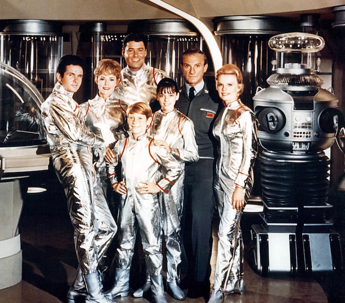 (Photo courtesy of CBS) Mark Goddard as Don West, June Lockhart as Maureen Robinson, Guy Williams as John Robinson, Billy Mumy as Will Robinson, Angela Cartwright as Penny Robinson, Jonathan Harris as Dr. Smith, Marta Kristen as Judy Robinson, and the Robot in the original “Lost in Space.”