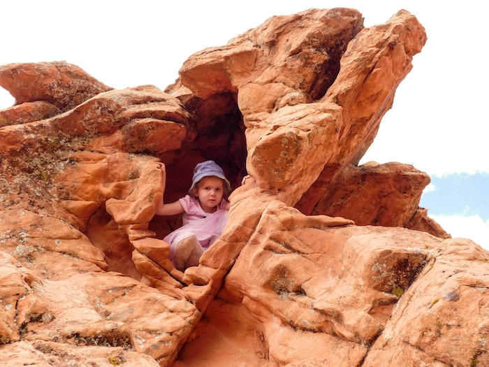 Erin Alberty  |  The Salt Lake TribuneA young hiker climbs in a rock formation along the Babylon Arch trail April 1, 2017 in the Red Cliffs Desert Reserve near Leeds.