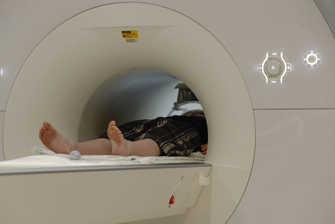Francisco Kjolseth | The Salt Lake TribuneBryce Hortin, 11, of Syracuse is positioned in the machine that will periodically capture images of his brain over a 10-year study. At the U of U, psychology professor Deborah Yurgelun-Todd aims to enroll 1,000 Utahns into a study that will ultimately include 12,000 across the country to monitor kids in their preteen and teen years.