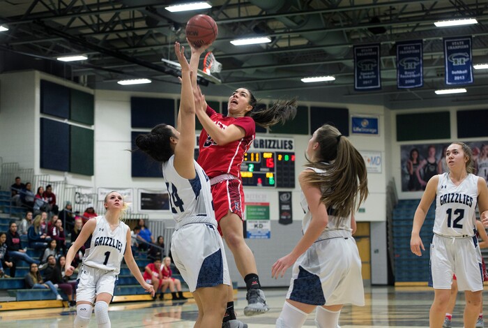 (Scott Sommerdorf | The Salt Lake Tribune)
East's Liana Kaitu'u drives during first half play as Copper Hills defeated East 82-62, Friday, December 29, 2017.