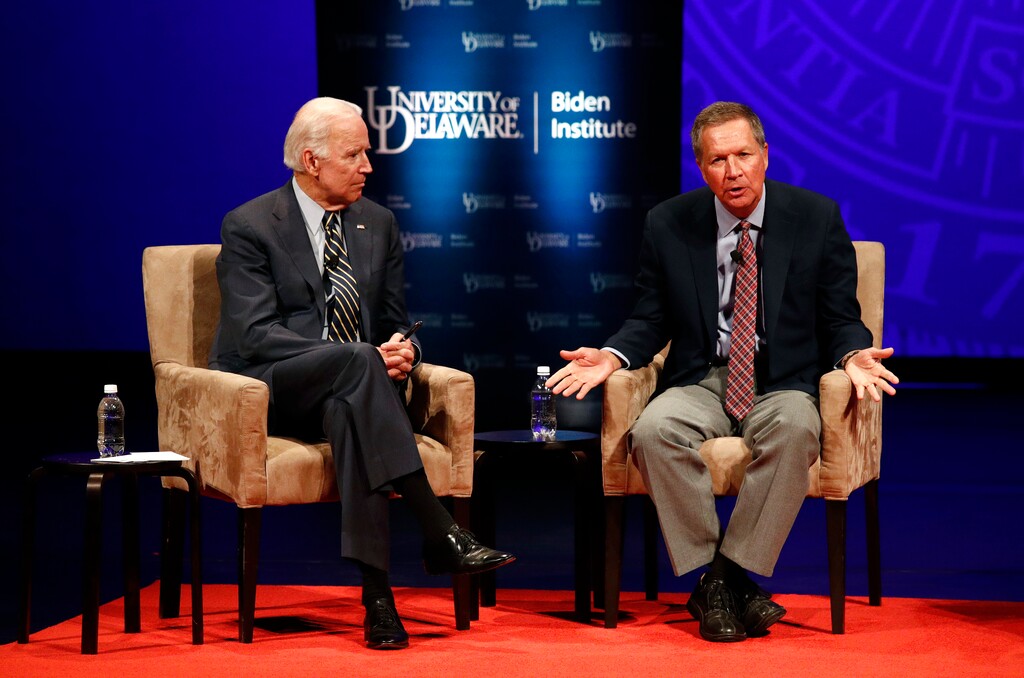 (Patrick Semansky | AP file photo)  Former Vice President Joe Biden, left, and Ohio Gov. John Kasich participate in a discussion on bridging political and partisan divides at the University of Delaware in Newark, Del., Tuesday, Oct. 17, 2017.