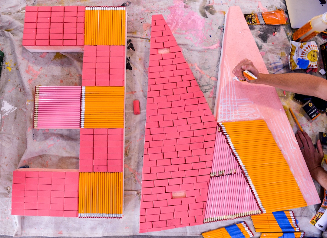 (Leah Hogsten  |  The Salt Lake Tribune) Love Letters Museum co-designer and lettering artist Becca Clason creates giant letters made of pencils and erasers that will spell “Write On” to hang on a wall at the Love Letters Museum show opening June 21, 2109. Love Letters is the newest 15,000-square-foot interactive art installation at The Gateway dedicated to the love of letters, as well as typography, books and literal love letters. “It is our attempt to use what we know best (letters, words, and art) to encourage each of our visitors to find and tell their own story. And to find the art in other's stories” -Love Letters Museum. ​