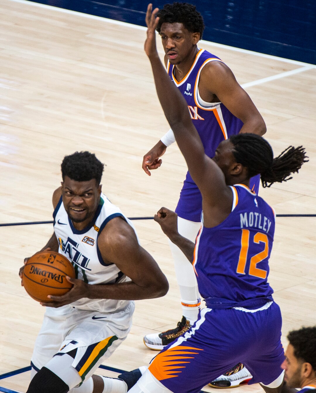(Rick Egan | The Salt Lake Tribune)  Utah Jazz center Udoka Azubuike (20) looks for a shot, as Phoenix Suns forward, Johnathan Motley (12), in preseason NBA action between Utah Jazz and Phoenix Suns at Vivint SmartHome Area, on Saturday, Dec. 12, 2020.