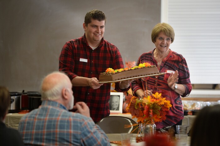(Scott Sommerdorf | The Salt Lake Tribune)
Doug Shumway and Georgia Dodge Spear present a cake as their families gathered for a reunion, Thursday, November 9, 2017 at the Bountiful Tabernacle.