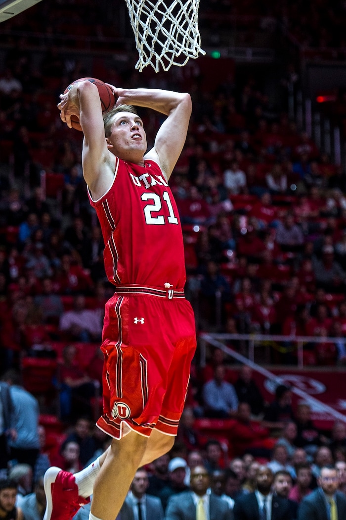 (Chris Detrick  |  The Salt Lake Tribune)  Utah Utes forward Tyler Rawson (21) dunks the ball during the game at the Jon M. Huntsman Center Thursday, November 16, 2017.   