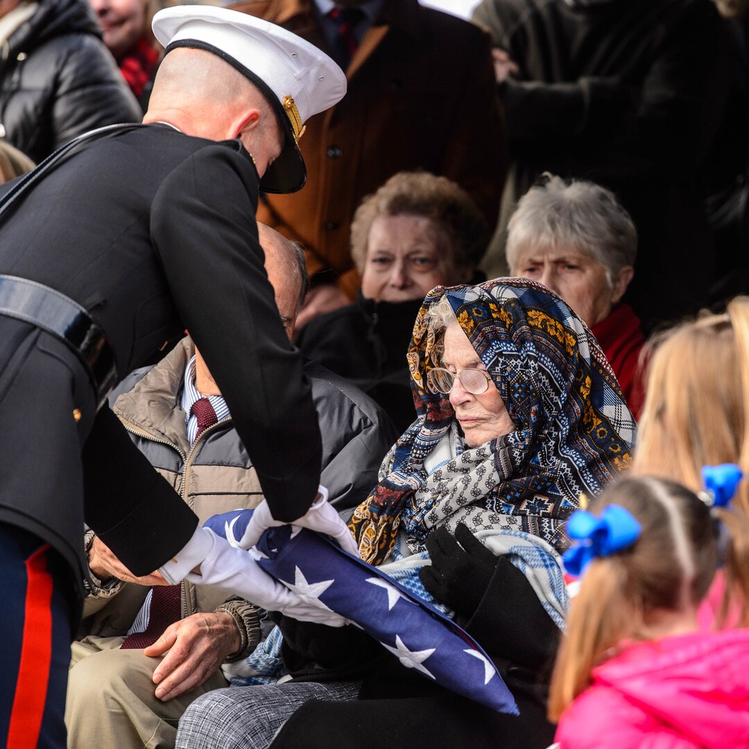 (Trent Nelson  |  The Salt Lake Tribune)
A flag is given to Charmain Hatch, sister-in-law of Marine Pfc. Robert J. Hatch, at the Bountiful City Cemetery on Saturday, Dec. 14, 2019. Hatch was killed in action Nov. 22, 1943, on the island of Betio.