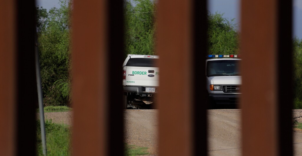 In this Tuesday, Sept. 15, 2015, photo  U.S. Customs and Border Patrol agents patrol along the border fence in Hidalgo, Texas. The staggered fence or wall, costing $6.5 million per mile, runs along  54 miles of Texas 1,254-mile border with Mexico. Adding to the Texas wall may be difficult, courtesy of the borders sheer length, the fact that it sits in the center of the snaking Rio Grande, and because international treaties with Mexico prevent either country from constructing within the rivers flood plains. Finishing the some 1,300 miles of border fencing would also be expensive, costing billions of dollars to complete.  (AP Photo/Eric Gay)