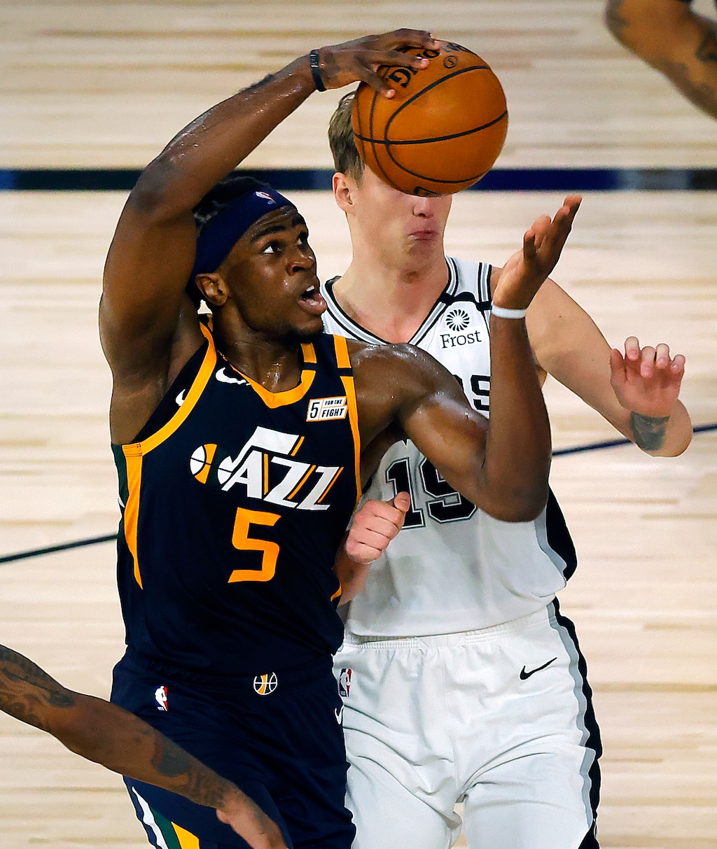Utah Jazz's Jarrell Brantley (5) draws a foul from San Antonio Spurs' Luka Samanic  (19) during the fourth quarter of an NBA basketball game Thursday, Aug. 13, 2020, in Lake Buena Vista, Fla. (Kevin C. Cox/Pool Photo via AP)
