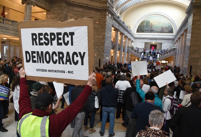 (Francisco Kjolseth  |  The Salt Lake Tribune)  Robert Walton joins the fight in the Capitol rotunda on Monday, Jan, 28, 2019, on the first day of the Legislative session to rally in support of protecting Proposition 3, the Medicaid Expansion law recently passed by voters.