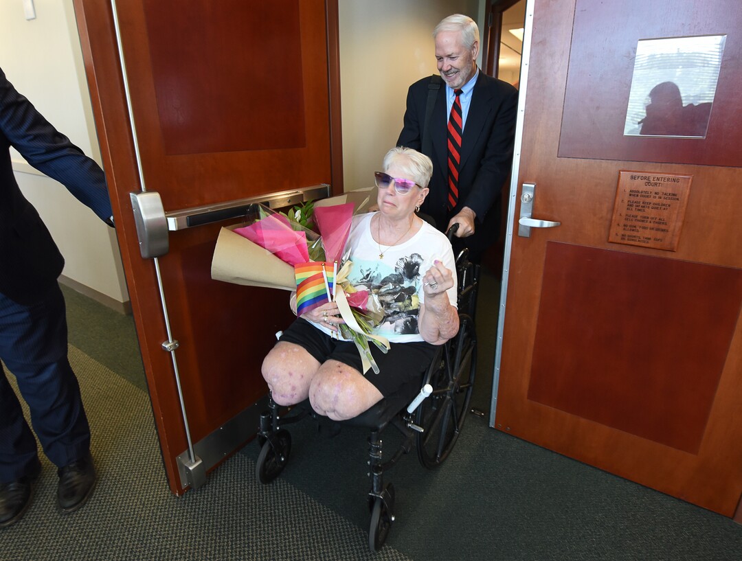 (Francisco Kjolseth  |  The Salt Lake Tribune)  Bonnie Foerster, 74, of South Salt Lake finally gets her wish of marrying her common-law partner of 50 years, Beverly Grossaint, even though she died on May 27. Foerster, who is legally blind and a double amputee shed tears of joy on Tuesday, Aug. 21, 2018, exclaiming "I can finally start healing," after a judge provided the legal recognition and allowed her to be legally married, as she exits the courtroom with assistance from her attorney Roger Hoole.