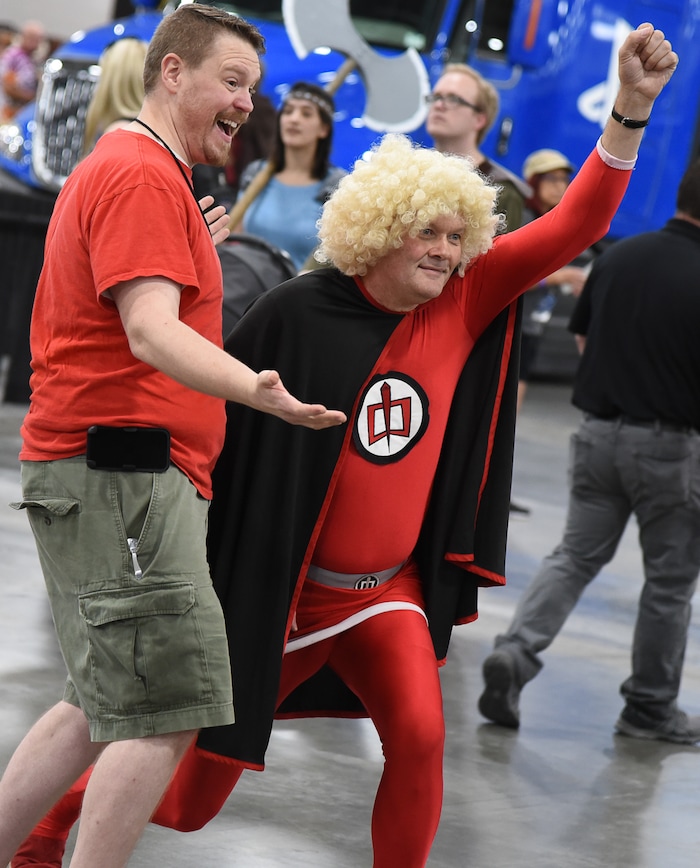 (Francisco Kjolseth  |  The Salt Lake Tribune)  Hyrum Miller, left, poses for a photograph with The Greatest American Hero played by Vincent Robinette, as they attend the start of FanX Salt Lake Comic Convention at the Salt Palace in Salt Lake City Thursday, Sept. 6, 2018, during the three-day pop culture convention.