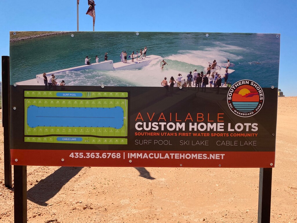 (Mark Eddington | The Salt Lake Tribune) Crews work on a new community for waterskiing, wakeboarding and wake-surfing called Southern Shore, a new development being built in Hurricane, the first private luxury surfing community in Utah. Each of the 34 homes fronting the lake will have its own boathouse to store a boat. 
