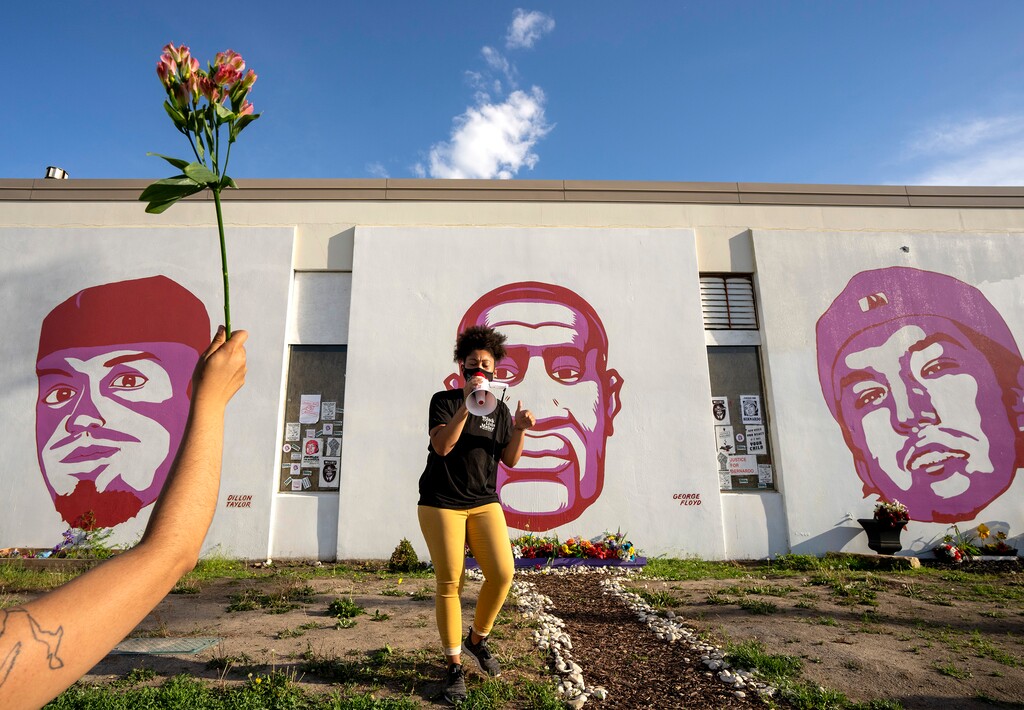 (Rick Egan | The Salt Lake Tribune) Rae Duckworth gives an emotional speech during a vigil marking the anniversary of the death of George Floyd, at the murals of people killed by police, in Salt Lake City, on Tuesday, May 25, 2021.