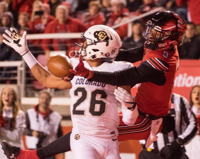 (Rick Egan  |  The Salt Lake Tribune) Colorado Buffaloes defensive back Isaiah Oliver (26) breaks up a pass intended for Utah Utes wide receiver Darren Carrington II (9), in PAC-12 football action Utah Utes vs. Colorado Buffaloes at Rice-Eccles stadium, Saturday, November 25, 2017.