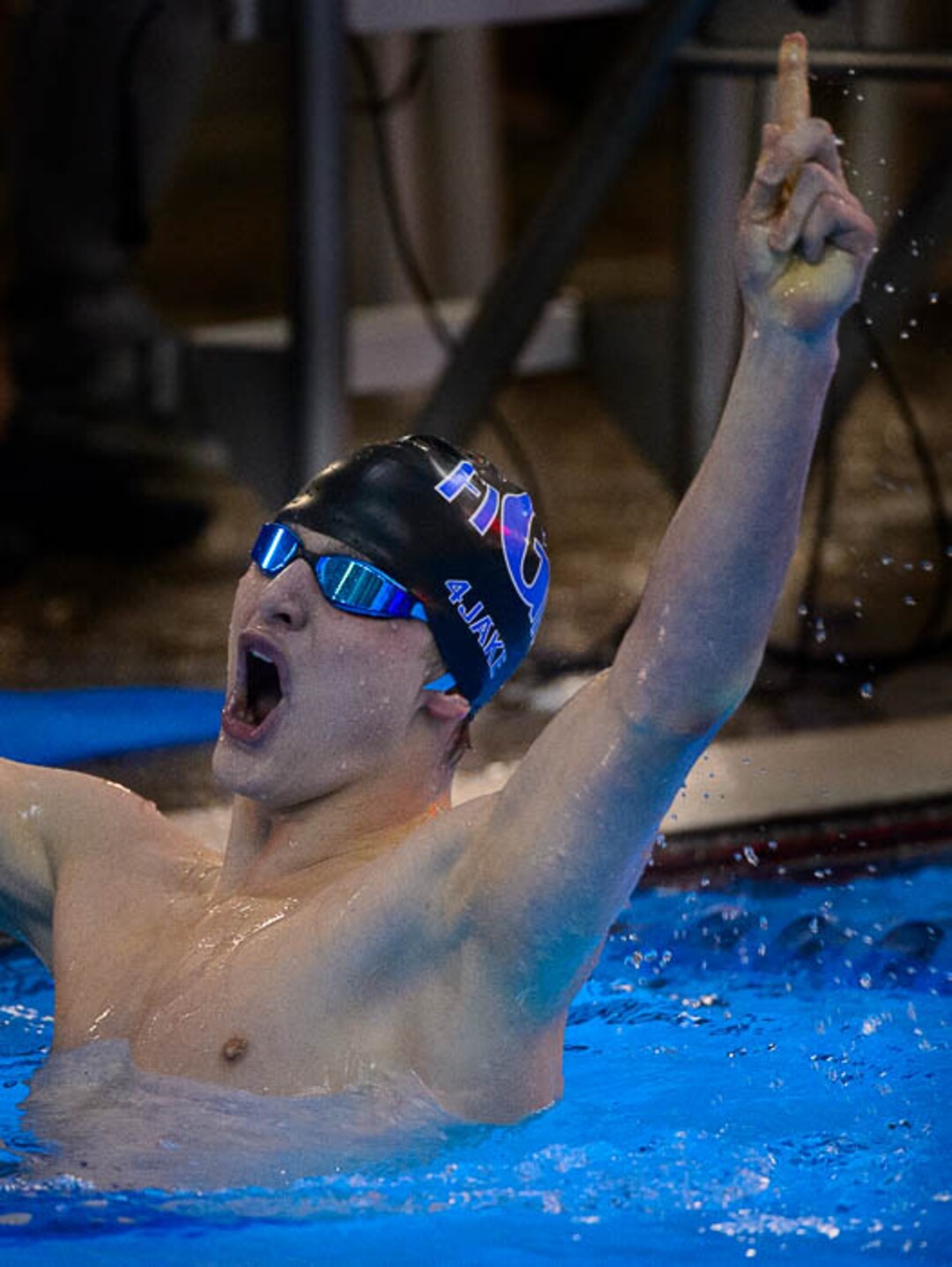 (Trent Nelson | The Salt Lake Tribune)  Pleasant Grove High School's Devin Bunnell wins the Men 200 Yard Freestyle at the high school swimming 6A State Championships in Bountiful, Thursday February 8, 2018.
