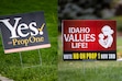 (Drew Nash | The Times-News) Signs supporting and opposing Proposition 1 to expand abortion access are displayed in Twin Falls, Idaho. The Church of Jesus Christ of Latter-day Saints is unlikely to face any IRS repercussions for its efforts against Prop 1.