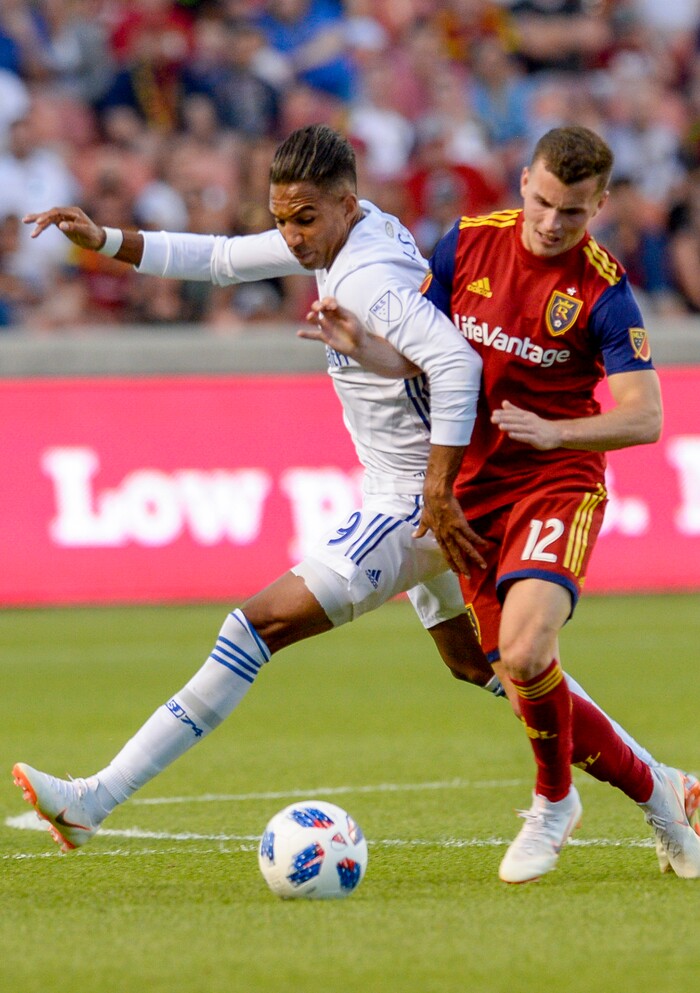Leah Hogsten | The Salt Lake Tribune San Jose Earthquakes forward Danny Hoesen (9) battles Real Salt Lake forward Brooks Lennon (12) as Real Salt Lake hosts the San Jose Earthquakes at Rio Tinto Stadium in Sandy, Utah, Saturday, June 23, 2018.