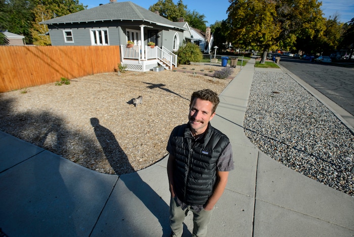 (Steve Griffin  |  The Salt Lake Tribune)  Mickey Campbell stands outside his Salt Lake City home, Thursday October 5, 2017, where he was told by the city his yard violated a law requiring at least 33% of front yard and park strip to be covered in vegetation. 