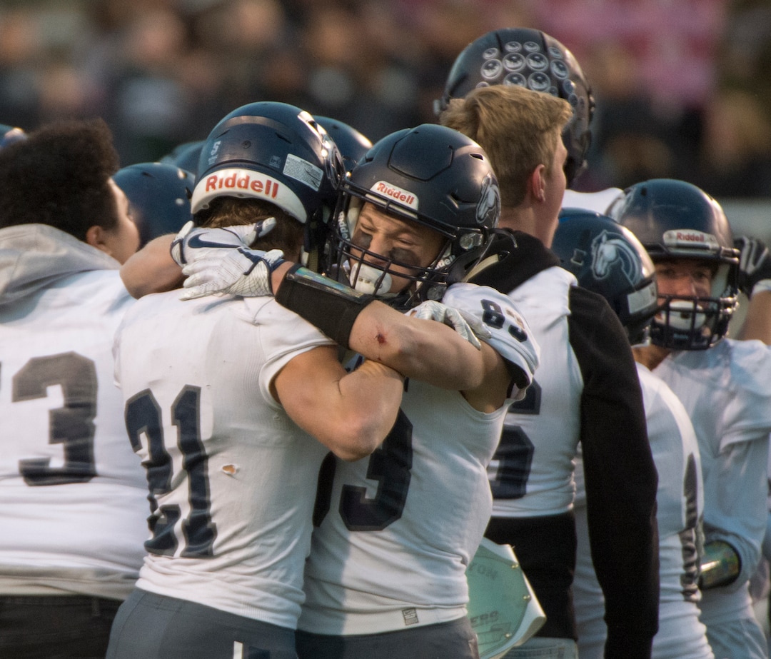 (Rick Egan  |  The Salt Lake Tribune)     Corner Canyon celebrates their win over  the Olympus Titans, in 5A football semifinal action between Olympus and Corner Canyon at Rice-Eccles Stadium, Thursday, Nov. 8, 2018.