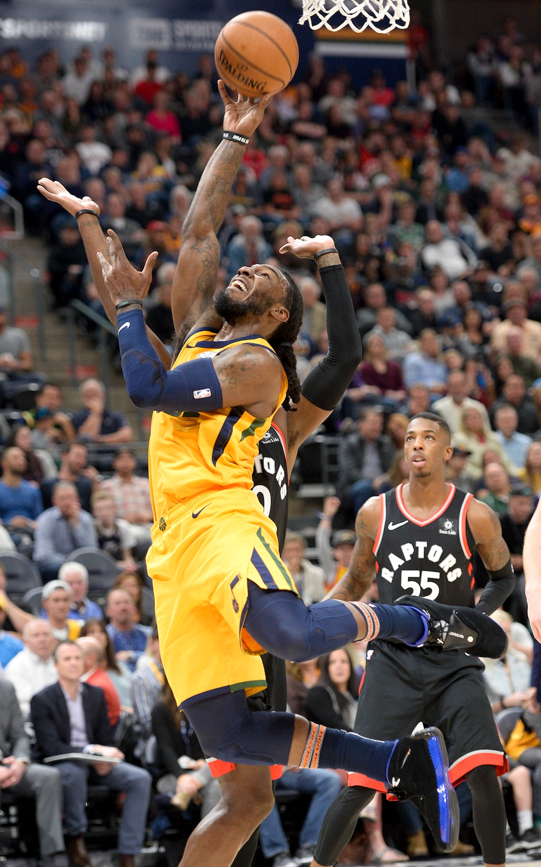 Leah Hogsten  |  The Salt Lake Tribune  Utah Jazz forward Jae Crowder (99) fights Toronto Raptors forward CJ Miles (0) to get to the net as the Utah Jazz host the Toronto Raptors, Monday, Nov. 5, 2018 at  Vivint Smart Home Arena.