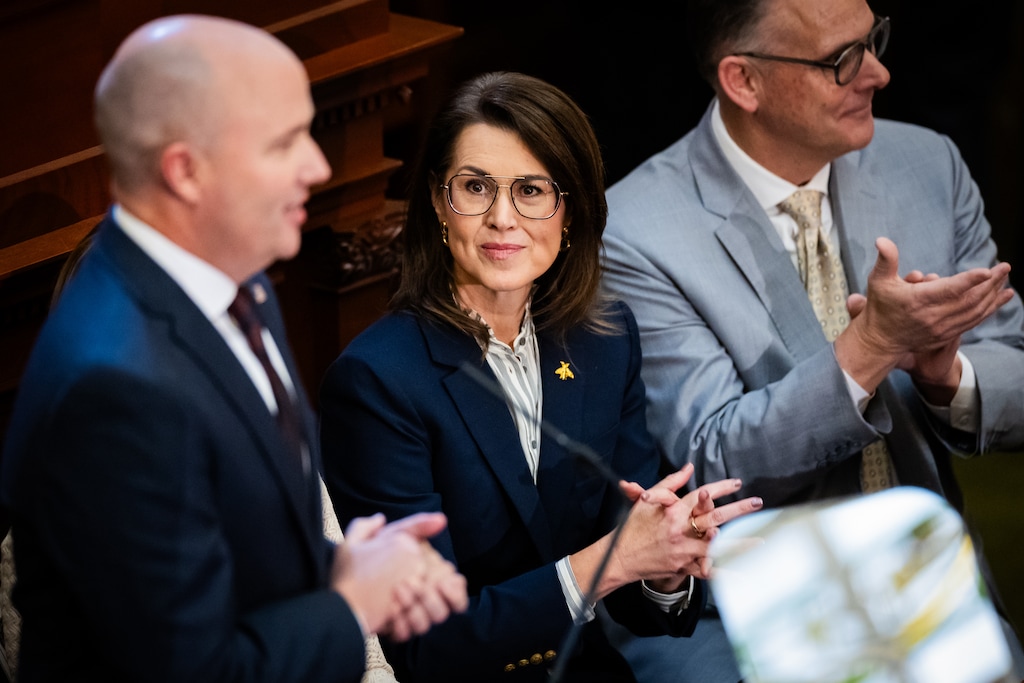 (Tess Crowley | Pool) Lt. Gov. Deidre Henderson, center, listens as Gov. Spencer Cox delivers his 2026 State of the State address in the House chamber at the Capitol in Salt Lake City on Thursday, Jan. 22, 2026.