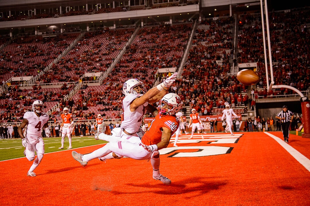 (Trent Nelson | The Salt Lake Tribune)  Utah Utes running back Troy McCormick Jr. (4) watches the ball bounce away, defended by Stanford Cardinal cornerback Alijah Holder (13), in the fourth quarter as the University of Utah hosts Stanford, NCAA football at Rice-Eccles Stadium in Salt Lake City Saturday October 7, 2017.