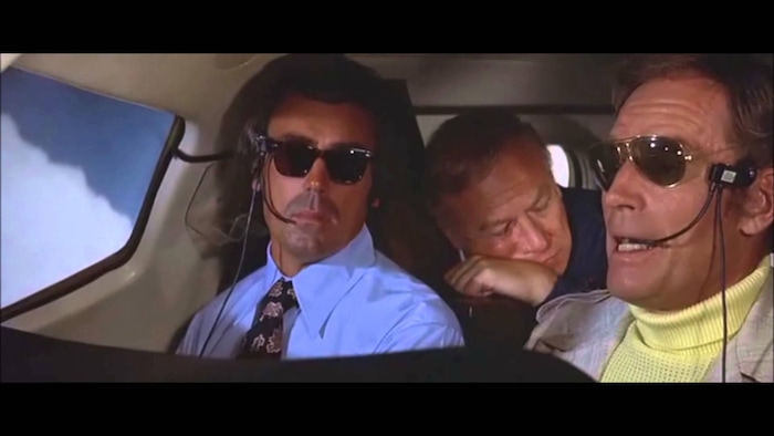 Charlton Heston (right, with James W. Gavin and George Kennedy) stars in the disaster epic "Airport 1975."