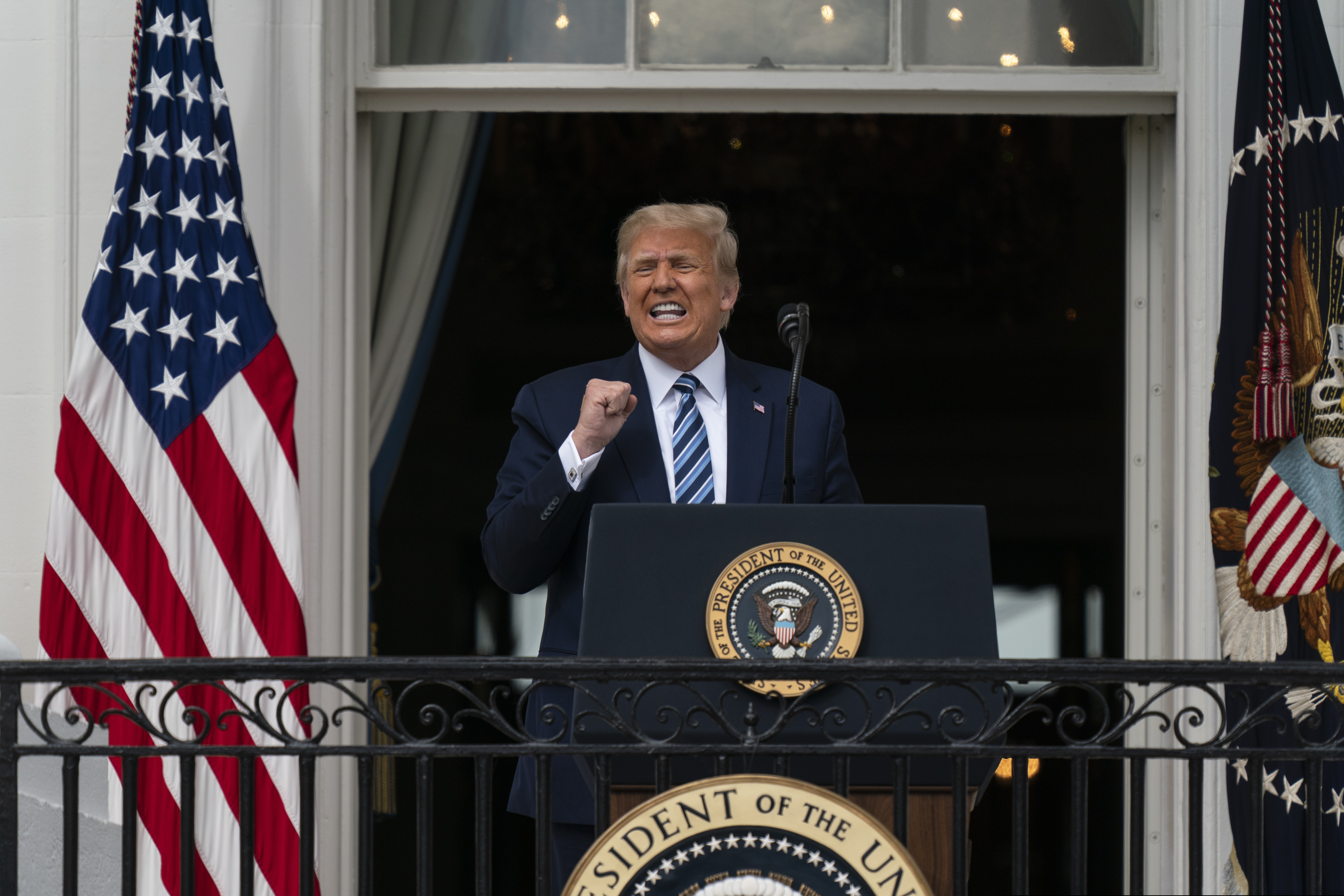 (Alex Brandon | AP file photo)  President Donald Trump speaks from the Blue Room Balcony of the White House to a crowd of supporters, Saturday, Oct. 10, 2020, in Washington.