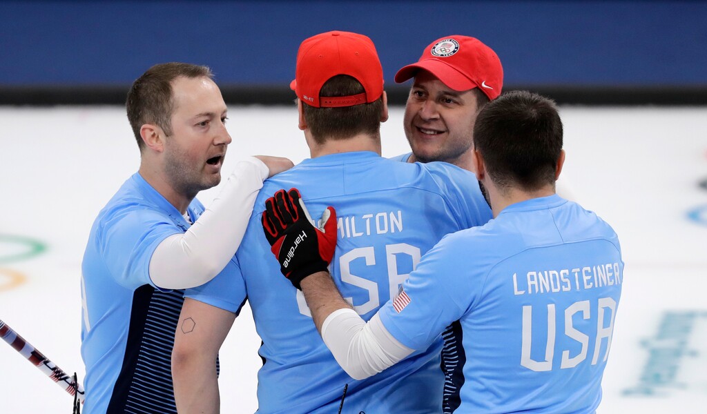 United States team jubilates after defeating Canada during the men's curling semi-final match at the 2018 Winter Olympics in Gangneung, South Korea, Thursday, Feb. 22, 2018. United States won. (AP Photo/Aaron Favila)
