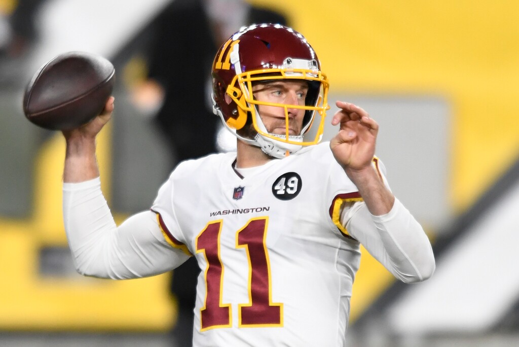 Washington Football Team quarterback Alex Smith (11) looks to throw a pass during the first half of an NFL football game against the Pittsburgh Steelers in Pittsburgh, Monday, Dec. 7, 2020. (AP Photo/Barry Reeger)