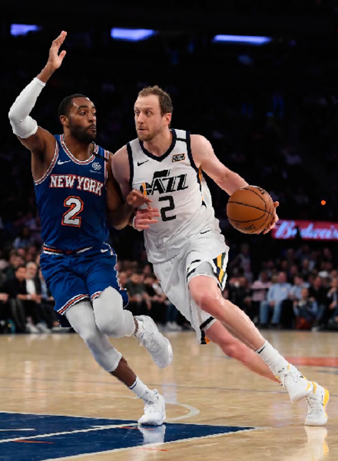 Utah Jazz guard Joe Ingles (2) drives toward the basket as New York Knicks guard Wayne Ellington (2) defends during the second half of an NBA basketball game in New York, Wednesday, March 4, 2020. (AP Photo/Sarah Stier)