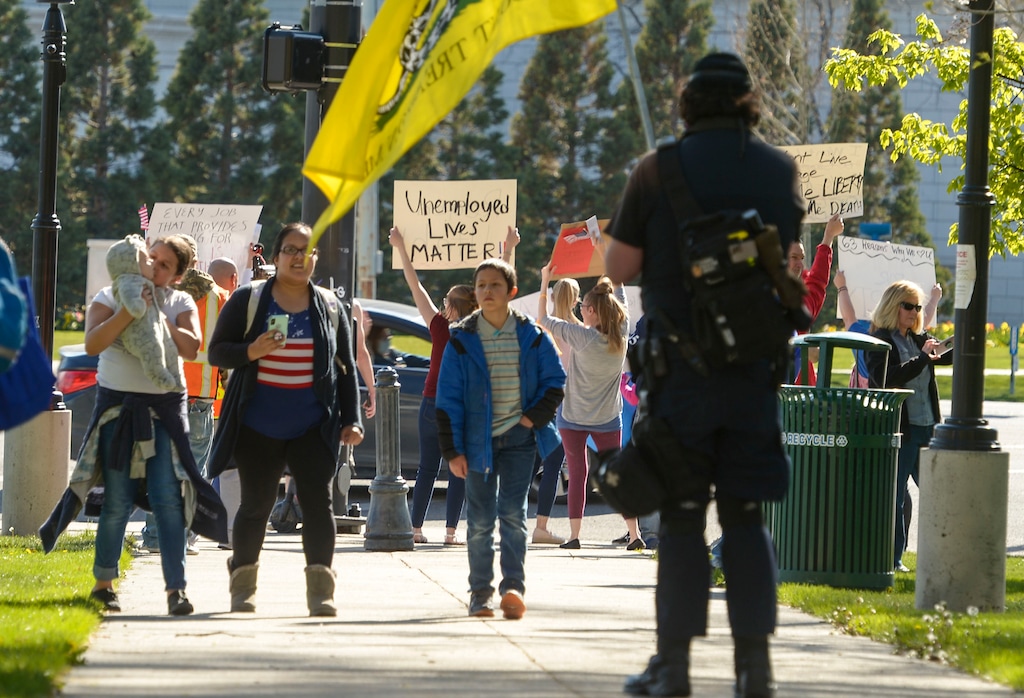 (Leah Hogsten | Tribune file photo) About 1,000 people protested the government mandated shutdown of businesses on the grounds of Salt Lake City Hall on April 18, 2020. A judge on Friday blocked a protest concert in Tooele County sought by the same organizers.