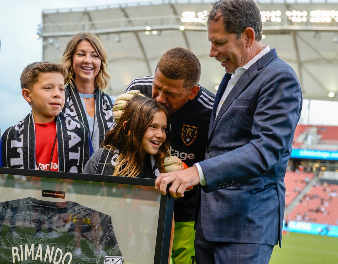 (Leah Hogsten  |  The Salt Lake Tribune) Nick Rimando, his wife Randi Peterson, daughter Benny and son Jet were celebrated on the home pitch Sat, July 13, 2019 at Rio Tinto Stadium for completing his 500th MLS regular-season game last week against the San Jose Earthquakes in San Jose. Rimando is the all-time MLS leader in wins, shutouts, games played and saves more than any other MLS goalkeeper. Tonight’s game against the Philadelphia Union will be Rimando’s 501st. At right is, Andy Carroll, business manager of RSL.
