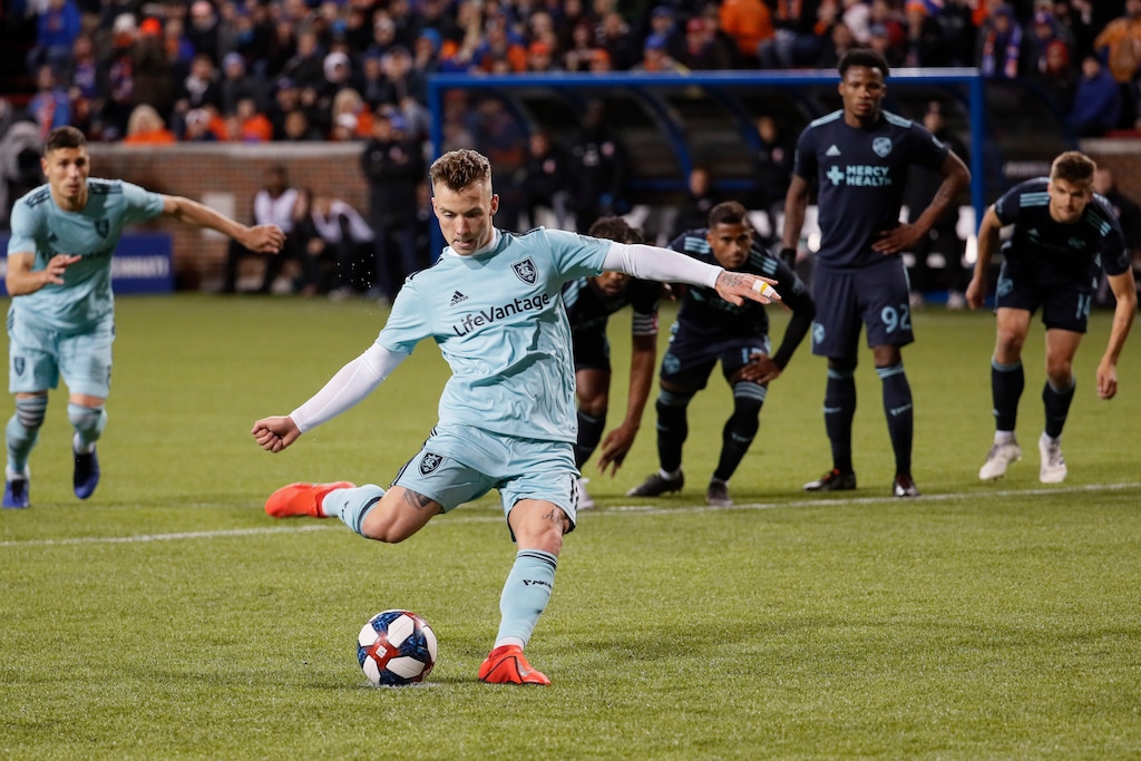 Real Salt Lake midfielder Albert Rusnak takes a penalty kick during the second half of the team's MLS soccer match against FC Cincinnati, Friday, April 19, 2019, in Cincinnati. (AP Photo/John Minchillo)