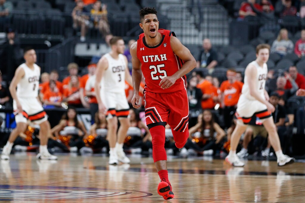 (John Locher | AP) Utah's Alfonso Plummer (25) reacts after making a 3-point shot against Oregon State during the first half of an NCAA college basketball game in the first round of the Pac-12 men's tournament Wednesday, March 11, 2020, in Las Vegas.