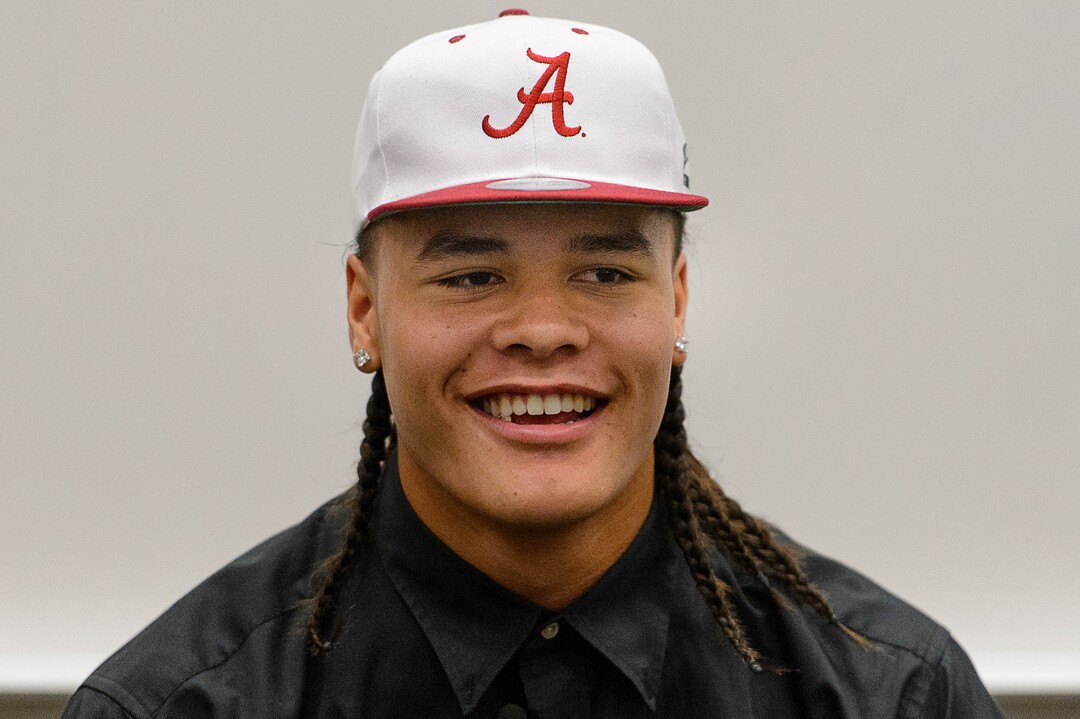 (Trent Nelson  |  The Salt Lake Tribune)  Olympus tight end Cameron Latu announces he's headed to Alabama during a news conference at Olympus High School in Salt Lake City Friday August 4, 2017.