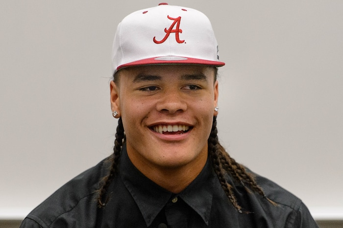 (Trent Nelson  |  The Salt Lake Tribune)  Olympus tight end Cameron Latu announces he's headed to Alabama during a news conference at Olympus High School in Salt Lake City Friday August 4, 2017.
