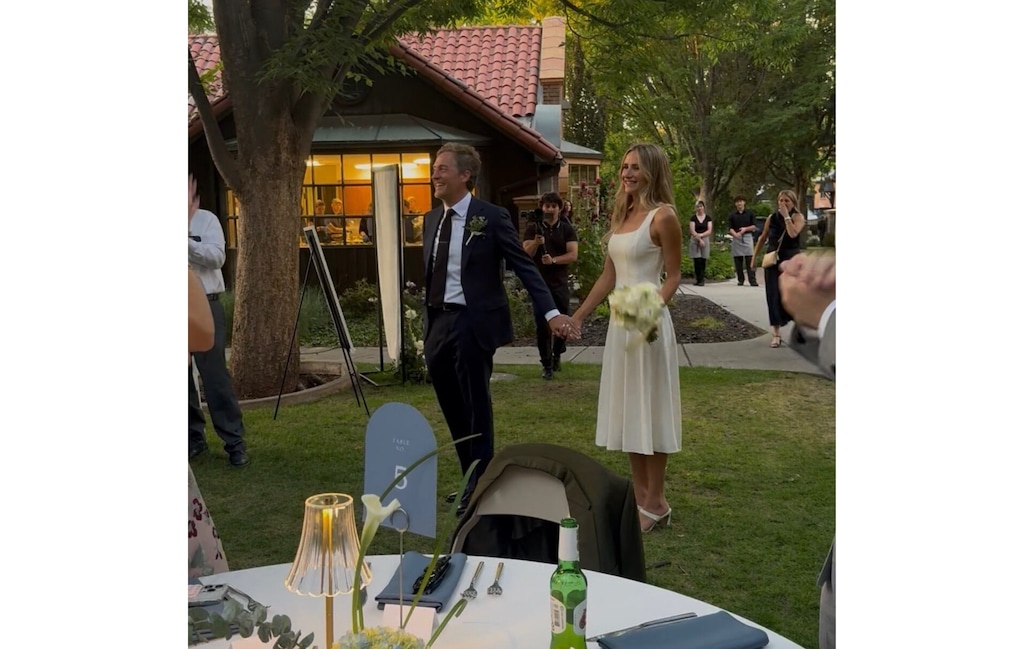 (Kian Robison) Jeff Robison and Grace Goddard arrive at the Garden Park Ward for their alternative wedding reception on June 20, 2026, after a wildfire forced the event to relocate.