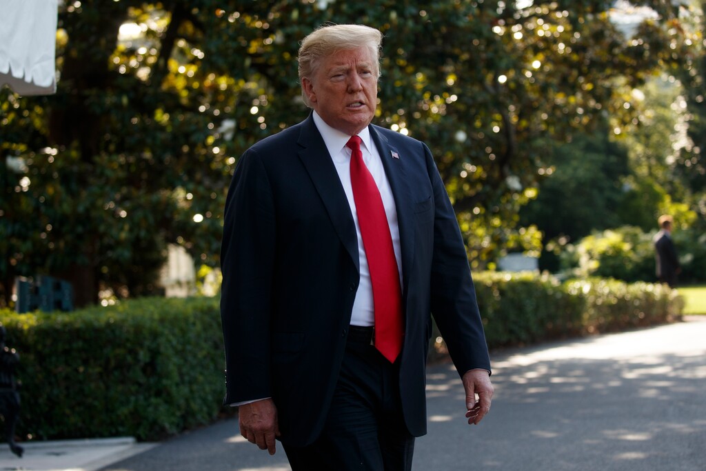 (Evan Vucci | AP file photo) President Donald Trump talks with reporters before departing on Marine One for the Air Force Academy graduation ceremony, Thursday, May 30, 2019, in Washington.