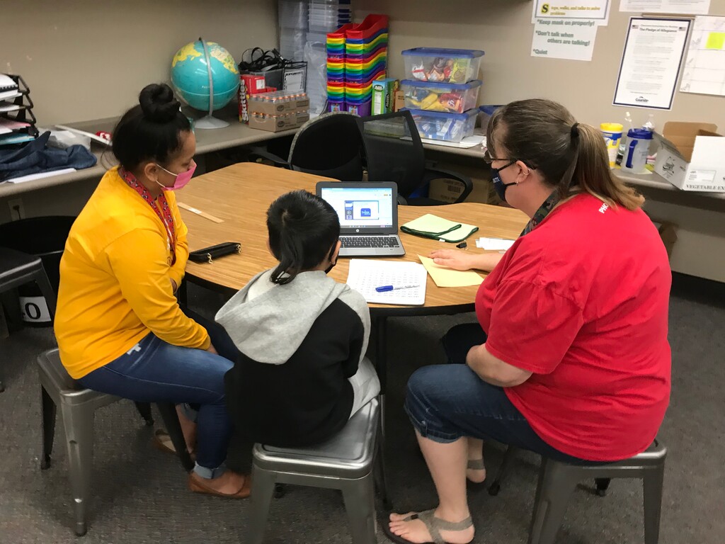 ( Julie Hirschi | Special to The Tribune )
Hillsdale Elementary School teacher Monica Cheshire, right, meets with Kyle, a 5th grader who is learning online, and his mother. Kyle asked to only be identified by his first name to protect his educational privacy.