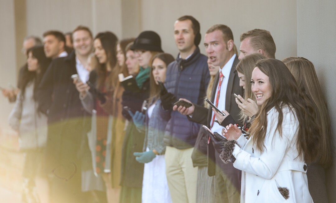 (Francisco Kjolseth  |  The Salt Lake Tribune)  The faithful sing hymnals as people arrive for the Sunday session of the 189th twice-annual General Conference of The Church of Jesus Christ of Latter-day Saints at the Conference Center in Salt Lake City on Sunday, Oct. 6, 2019.
