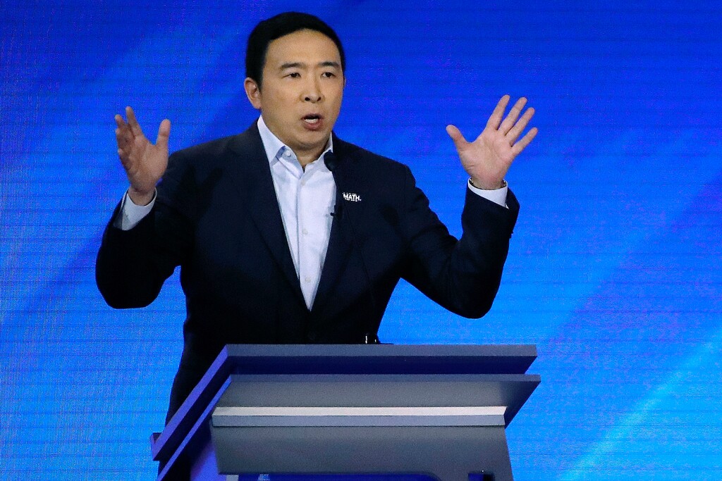 (Elise Amendola | AP) In this Feb. 7, 2020, photo, Democratic presidential candidate entrepreneur Andrew Yang speaks during a Democratic presidential primary debate at Saint Anselm College in Manchester, N.H.