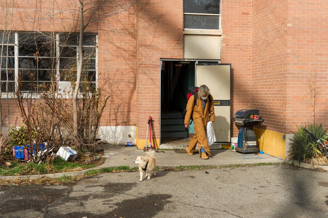 Alex Gallivan  |  Special to the Tribune 

Various agencies from Salt Lake City perform an evacuation of remaining tenants at The Georgia Apartments, Saturday February, 2019