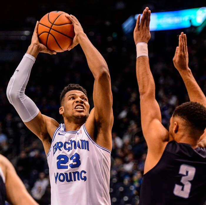 (Trent Nelson | The Salt Lake Tribune)   Brigham Young Cougars forward Yoeli Childs (23) shoots over San Diego Toreros guard Olin Carter III (3) as BYU hosts San Diego, NCAA basketball in Provo Saturday January 20, 2018.