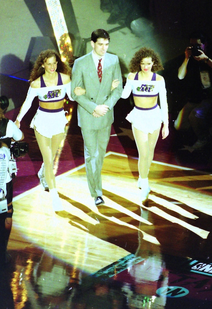 (Rick Egan  | Tribune File Photo)  John Stockton is escorted on to the court, during the 1993 All Star Game festivities in the Delta Center in Salt Lake City, Saturday, Feb. 20, 1993.