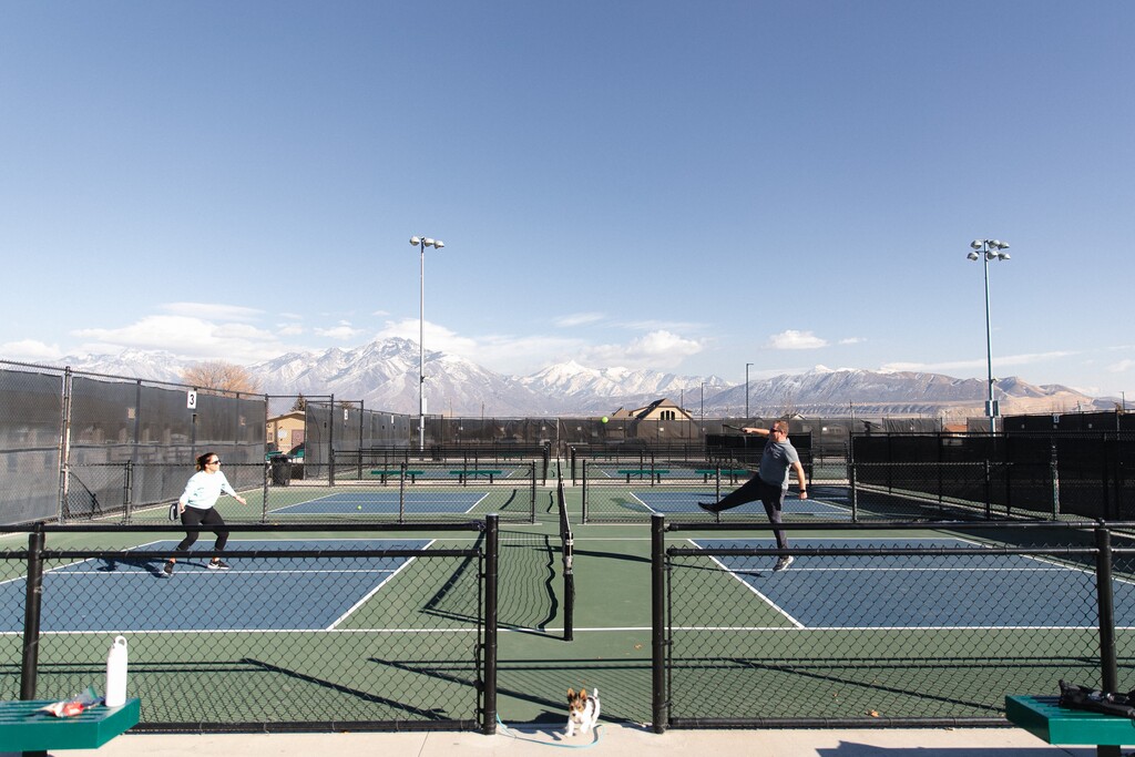 (Rachel Rydalch | The Salt Lake Tribune) Ben and Melinda Christensen play pickleball together on a sunny afternoon at Wardle Fields Regional Park in Bluffdale on Wednesday, Feb. 9, 2022.
